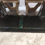 Green Veined Marble Dining Table with High-Gloss Dark Angled Pedestal and Stone Inlay Accents